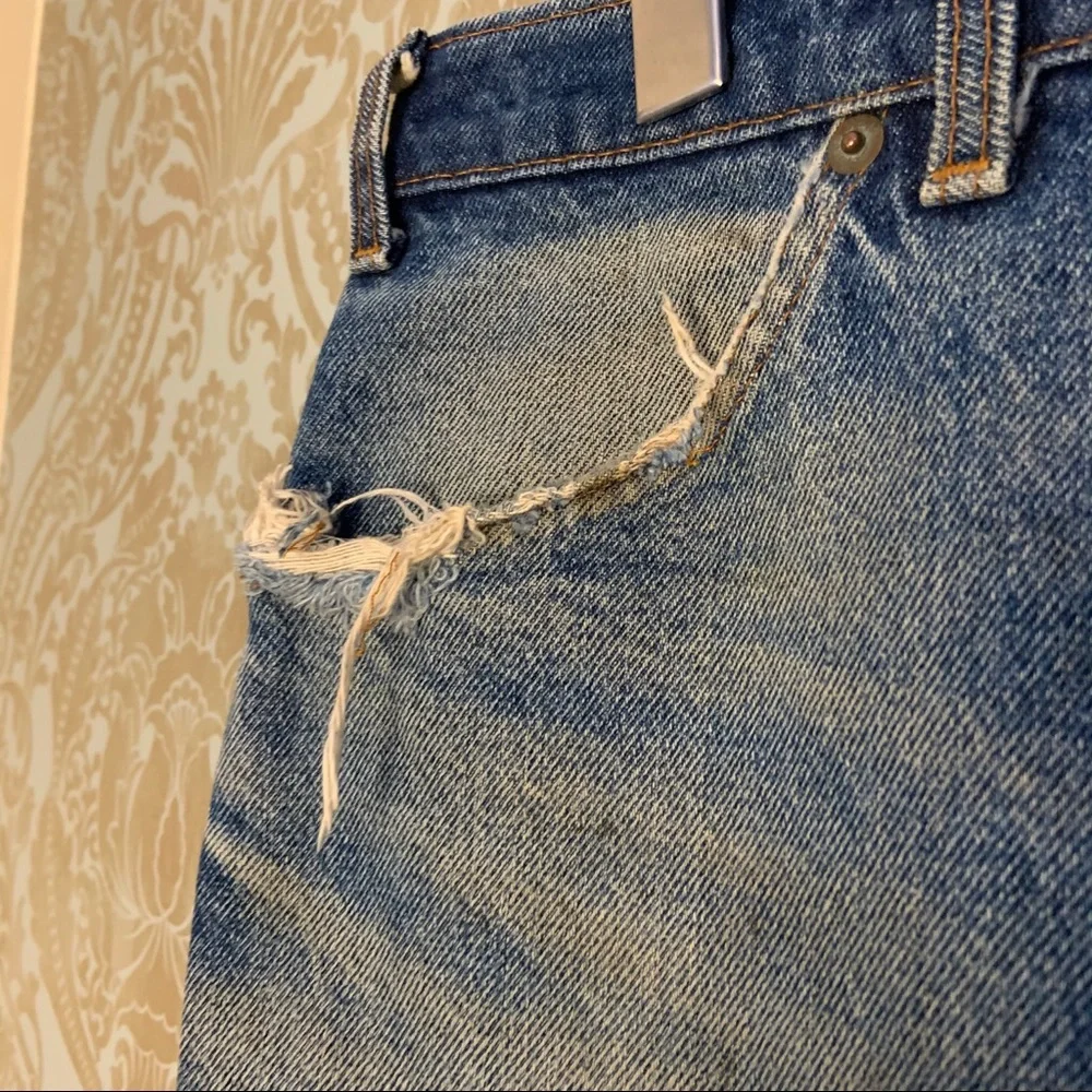 Levi's Faded Blue Distressed Denim Cutoff Shorts